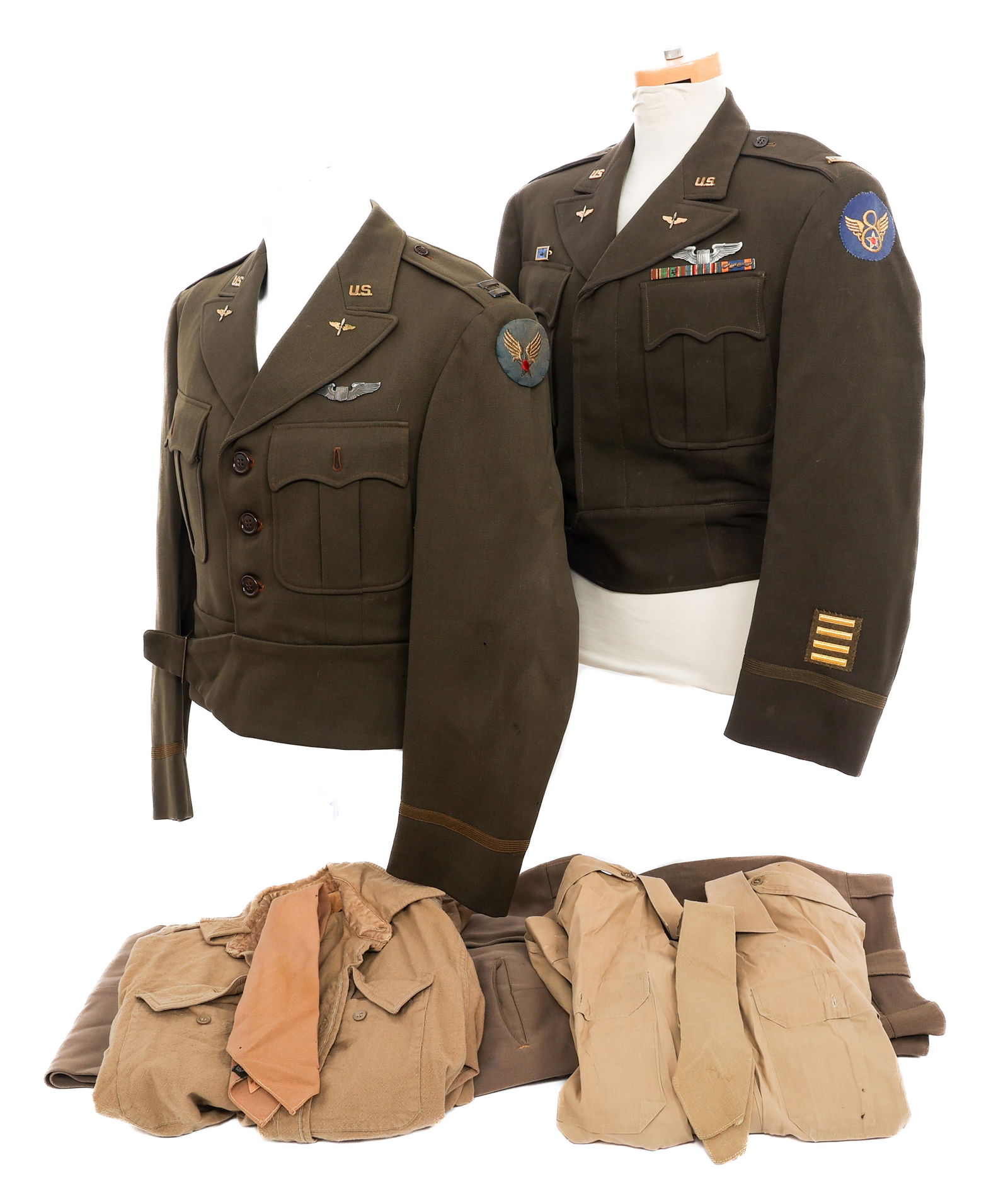 WWII USAAF OFFICER IKE JACKET UNIFORMS: WWII USAAF OFFICER IKE JACKET UNIFORMS WWII US Army Air Force Tailor Made Ike Jackets and Uniform Items. (2) Tailor Made Ike Jackets. USAAF and 8th Air Force Patches. 2nd Lieutenant and Captain should