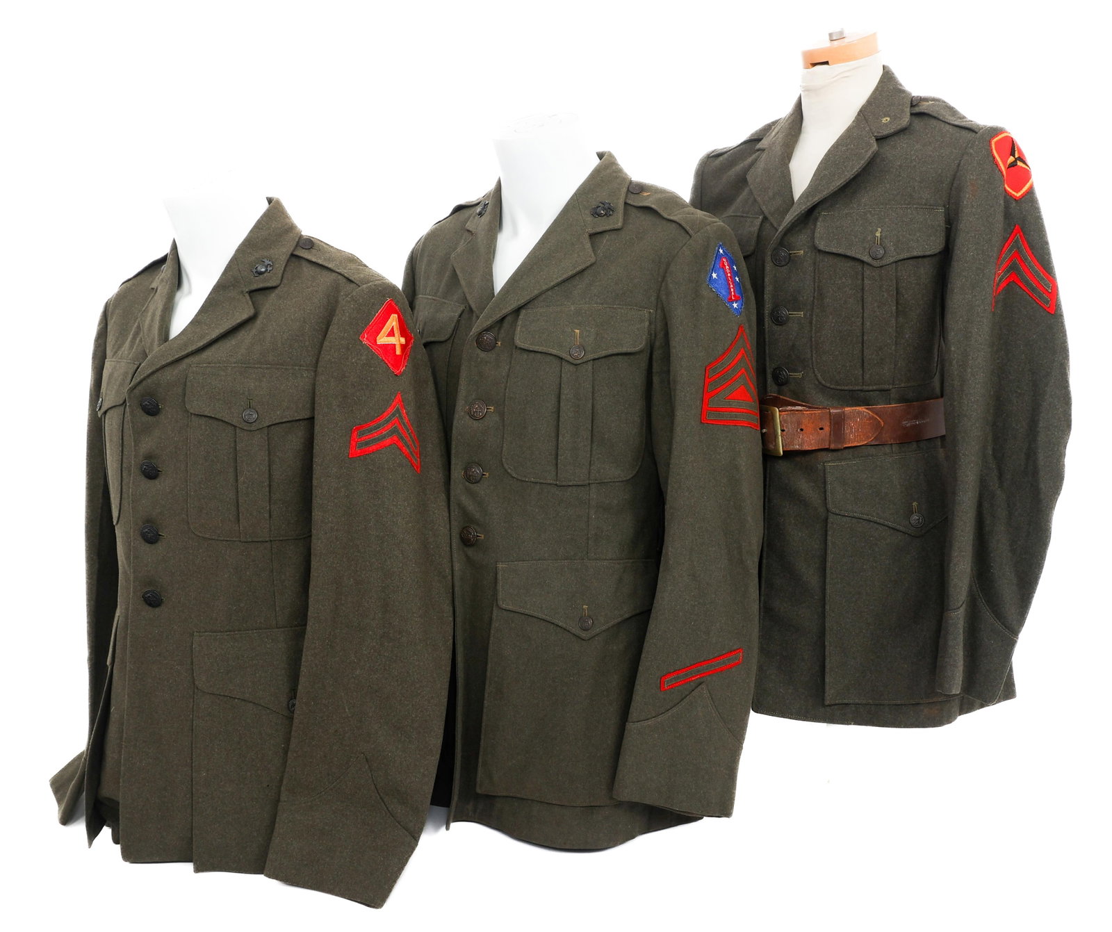 WWII USMC 1st, 3rd, & 4th DIV SERVICE ALPHA TUNICS: WWII USMC 1st, 3rd, & 4th DIV SERVICE ALPHA TUNICS WWII US Marine Corps 1st, 3rd and 4th Division Enlisted Service Alpha Tunics. (1) 1st Div. Green tunic with 1st Division shoulder patch, Corporal ran