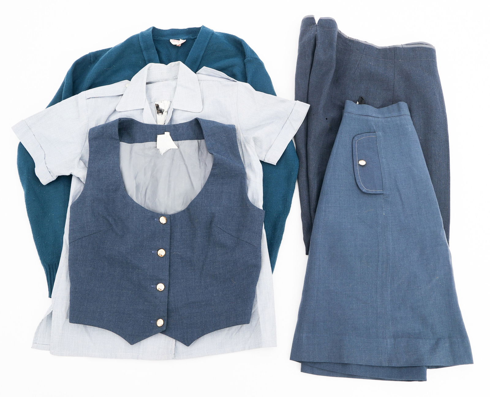 BUSH WAR RHODESIAN UDI AF WOMEN'S OFFICER UNIFORM: BUSH WAR RHODESIAN UDI AF WOMEN'S OFFICER UNIFORM Bush War Rhodesian UDI Air Force Officer Women's Uniform. (1) Uniform Shirt. Maker marked by Statesman. (1) Sweater. Maker marked by Helvyknit. (1) Ve