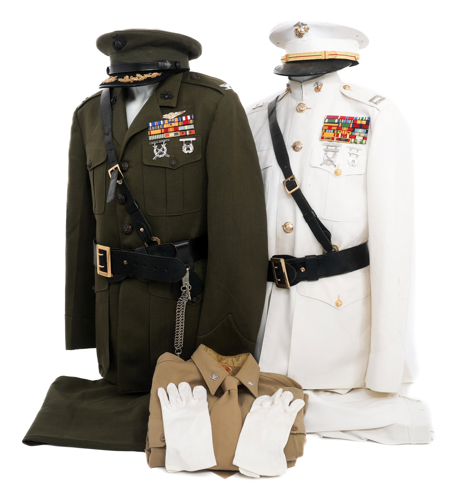 COLD WAR USMC OFFICER DRESS & SERVICE UNIFORM SETS: COLD WAR USMC OFFICER DRESS & SERVICE UNIFORM SETS Cold War USMC Officer Dress and Service Alpha Uniform Sets. (1) Captain's Dress Uniform. Includes visor cap, tunic, trousers, belt and white gloves. 