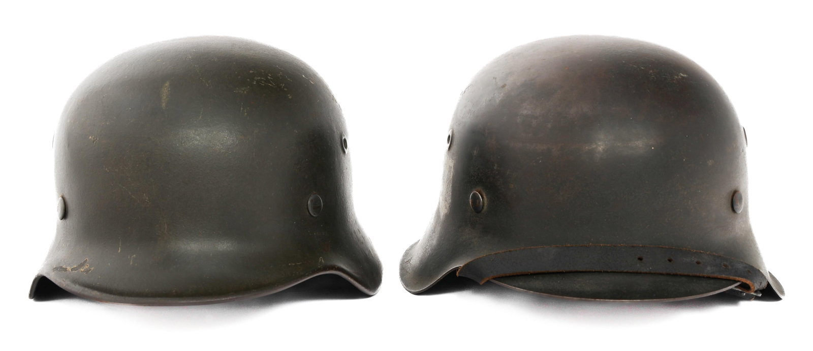 REFURBISHED GERMAN M40 & M42 SS COMBAT HELMETS: REFURBISHED GERMAN M40 & M42 SS COMBAT HELMETS Refurbished WWII German M40 & M42 Combat Helmets. (1) M40. Post War repainted shell and added SS decal. Maker mark "EF62" and serial number "2349" stampe