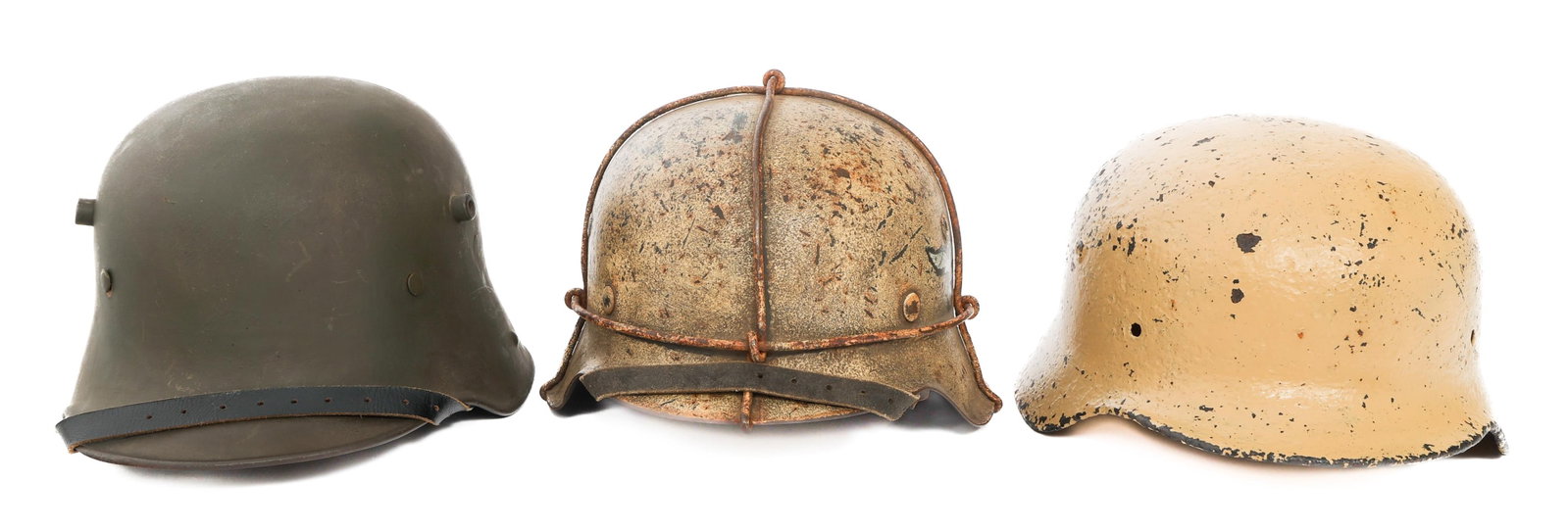 REFURBISHED WWI - WWII GERMAN COMBAT HELMETS: REFURBISHED WWI - WWII GERMAN COMBAT HELMETS Refurbished WWI - WWII German M16, M35, and M42 Combat Helmets. (1) Refurbished M16. Post war repainted shell. Maker marked "ET66" on the interior. Replace