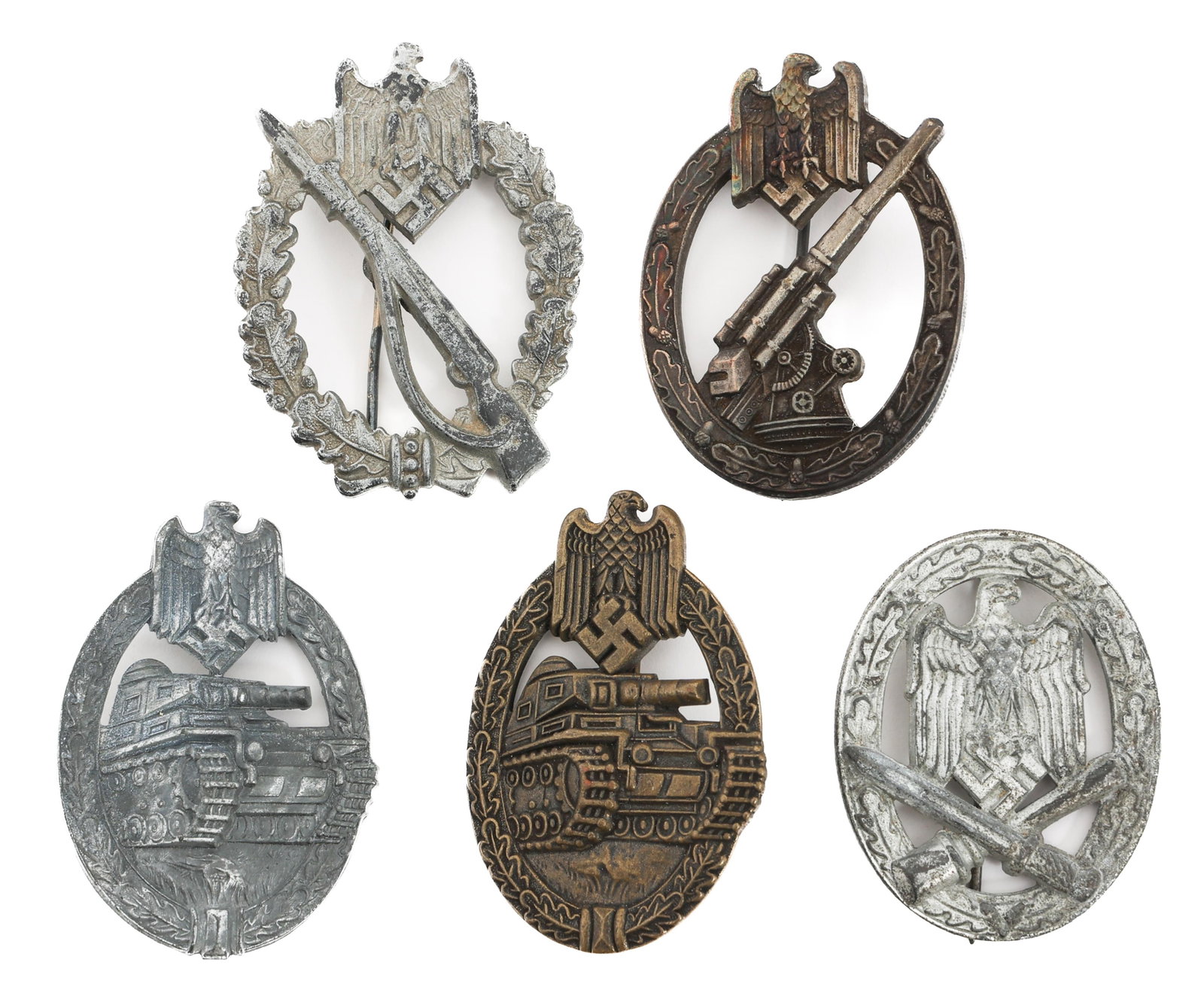 WWII GERMAN PANZER & INFANTRY ASSAULT BADGES: WWII GERMAN PANZER & INFANTRY ASSAULT BADGES WWII German Assault Badges. (1) Silver Panzer Assault Badge. Maker marked by Hermann Aurich. (1) Bronze Panzer Assault Badge. Maker marked by JFS. (1) Silv