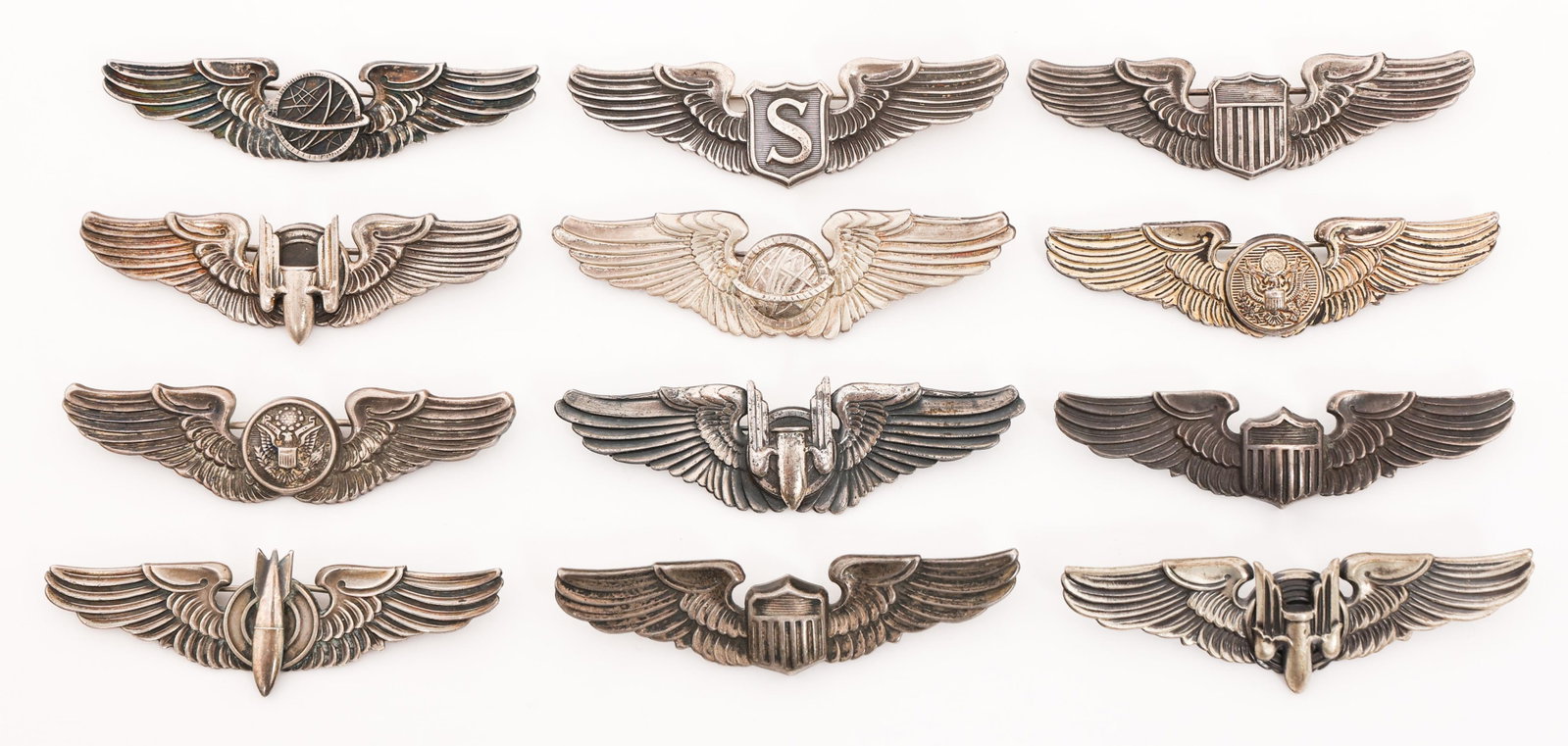 WWII USAAF 3" QUALIFICATION WINGS: WWII USAAF 3" QUALIFICATION WINGS WWII USAAF Qualification Wings. Clutchback and pinback construction. All are marked Sterling. Makers include NS Meyer, Amico, Gemsco and Balfour. (1) Bombardier. (3) 