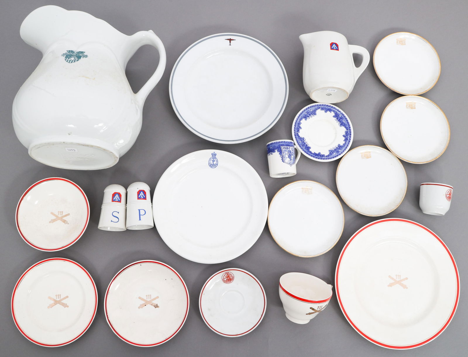 WWI - COLD WAR WORLD MILITARY PORCELAIN SERVEWARE: WWI - COLD WAR WORLD MILITARY PORCELAIN SERVEWARE WWI - Cold War World Military Porcelain Serveware. includes WWII German DAF plate, West Point Military Academy pitcher, US 5th Army pitcher & shakers,