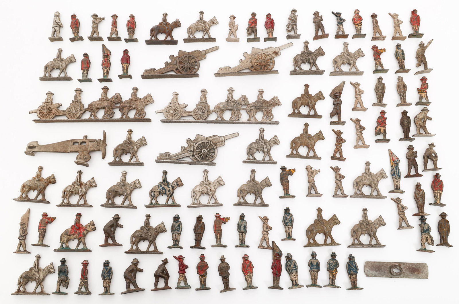 WWI - WWII DIE CAST TOY SOLDIER FIGURINES: WWI - WWII DIE CAST TOY SOLDIER FIGURINES WWI - WWII Die Cast Toy Soldiers. Includes soldiers, artillery guns, plane, and more. No visible maker marks or stamps. Some are painted. Weight: 5 lbs