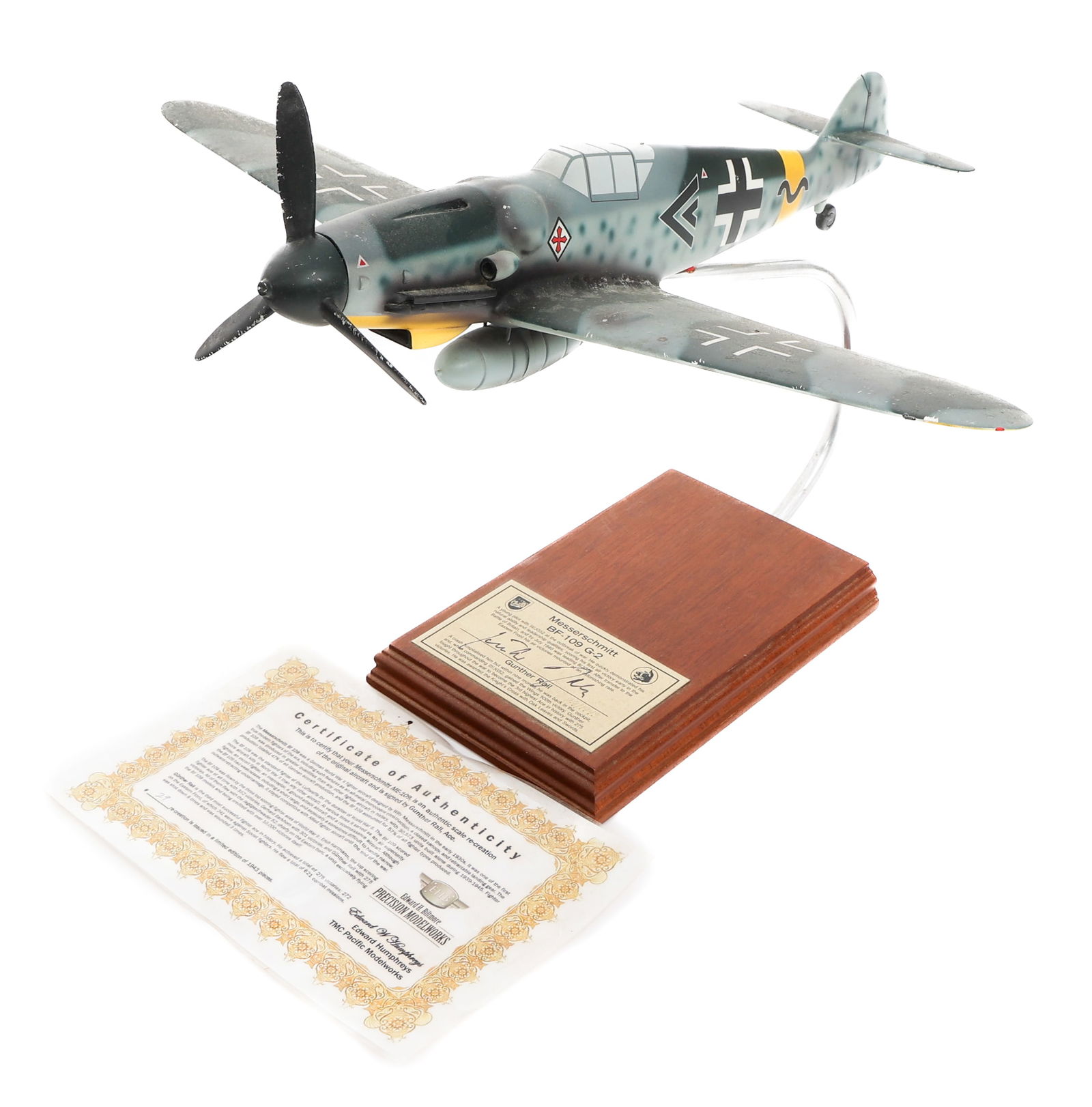 WWII GERMAN ACE G. RALL SIGNED ME-109 MODEL PLANE: WWII GERMAN ACE G. RALL SIGNED ME-109 MODEL PLANE WWII German Luftwaffe Ace Gunther Rall Signed Messerschmitt ME-109 Model Aircraft. Painted Mahogany construction. Hand signed on the data plate. Serie