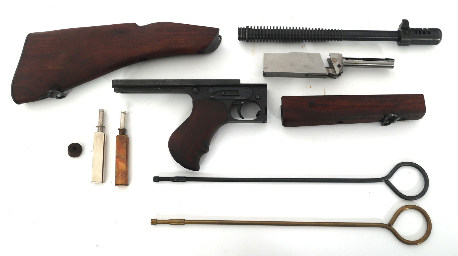 AUTO ORDNANCE THOMPSON PARTS: AUTO ORDNANCE THOMPSON PARTS Auto Ordnance Thompson parts. 12" barrel with Cutts compensator, bolt, grip with trigger group numbered 475246 and GEG (George E. Goll) inspection mark, butt stock, hand g