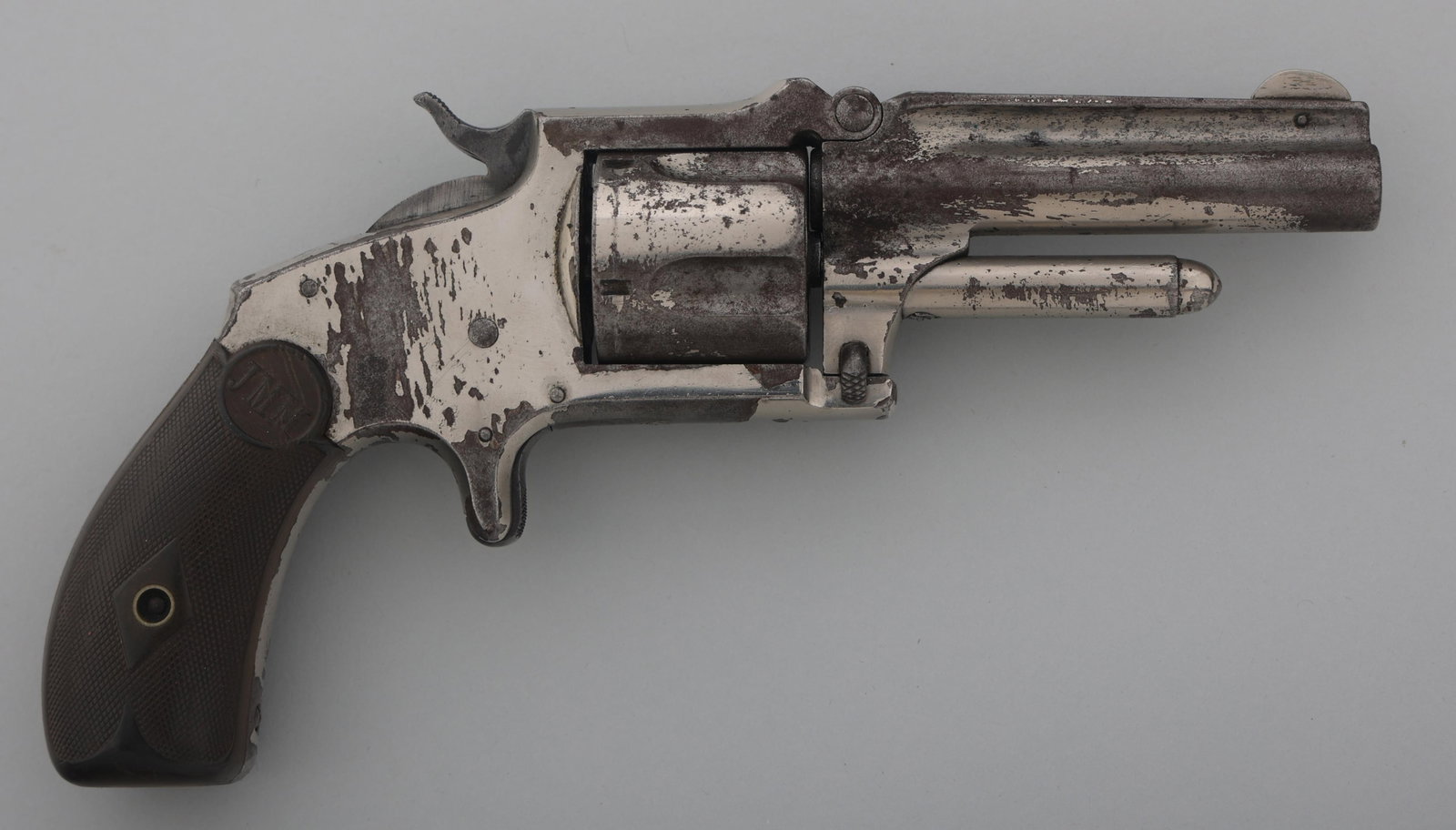 J.M. MARLIN 38 STANDARD 1878 TIP UP REVOLVER: J.M. MARLIN 38 STANDARD 1878 TIP UP REVOLVER J.M. Marlin 38 standard 1878 single action tip up revolver. .38 caliber. Top of barrel stamped "38 Standard 1878". Left side of barrel stamped "J.M. Marlin