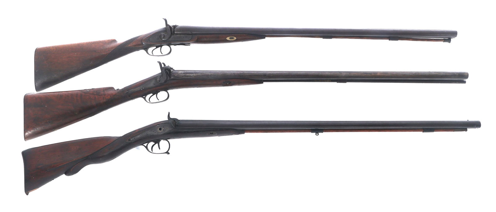 PERCUSSION SHOTGUNS FOR PARTS OR REPAIR: PERCUSSION SHOTGUNS FOR PARTS OR REPAIR Three percussion shotguns for parts or repair. A) E. James & Co. 12 gauge side by side percussion shotgun. Both barrels are fixed cylinder choke. Checkered wood
