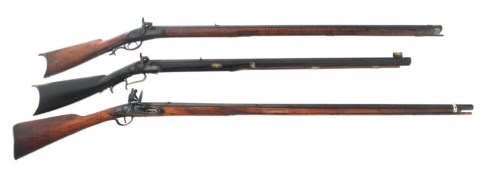 BLACK POWDER RIFLES FOR PARTS OR REPAIR: BLACK POWDER RIFLES FOR PARTS OR REPAIR Three black powder rifles for parts or repair. A) .38 caliber percussion rifle. Engraved side plate. Octagonal barrel. Wood stock. Fixed sights. Double set trig
