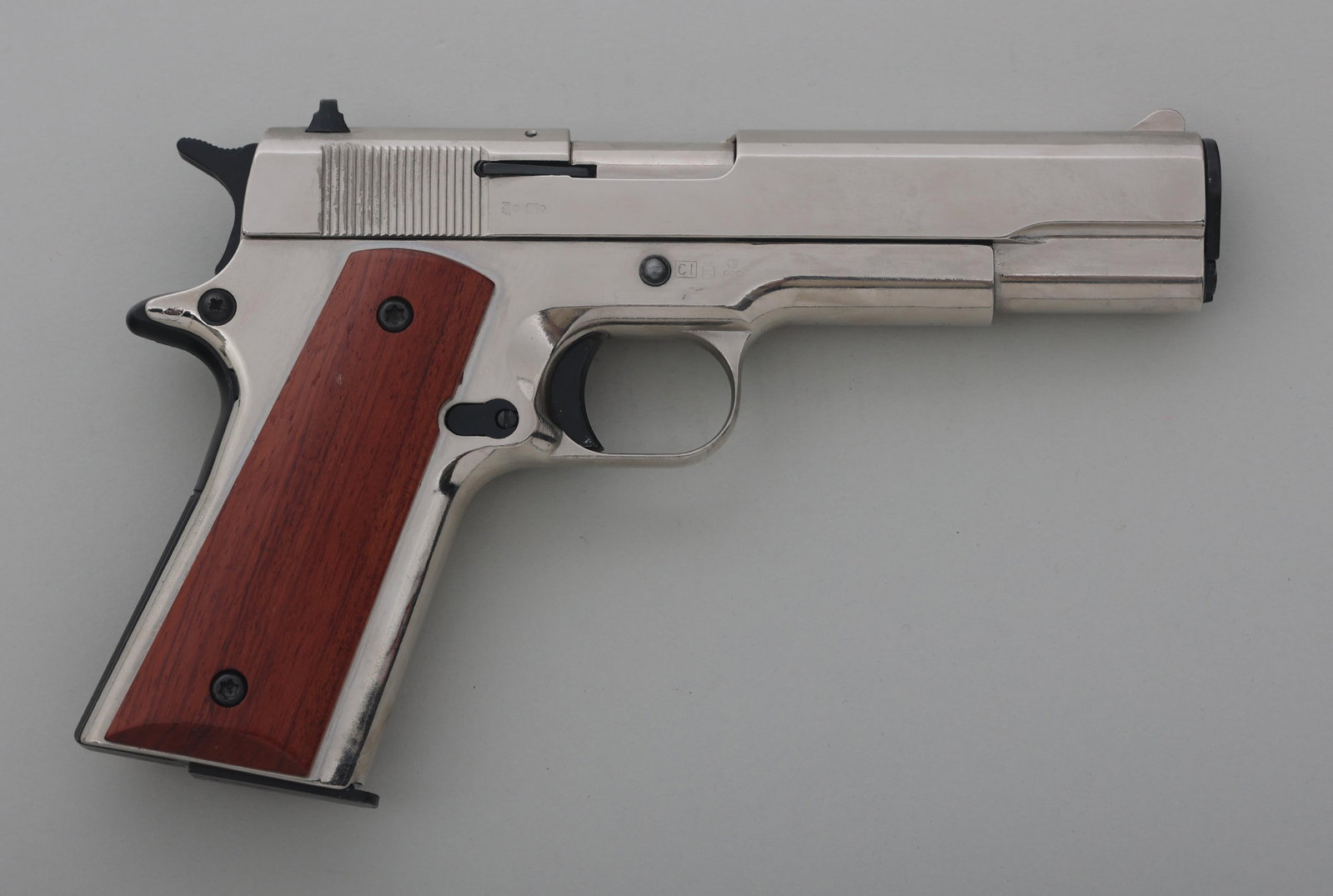 KIMAR MODEL 911 9mm SEMI AUTO BLANK FIRING PISTOL: KIMAR MODEL 911 9mm SEMI AUTO BLANK FIRING PISTOL Kimar Model 911 9mm PA semi automatic blank firing pistol. Barrel restricted. Stainless finish. Fixed sights. Wood grips. One magazine. Caliber / Gaug