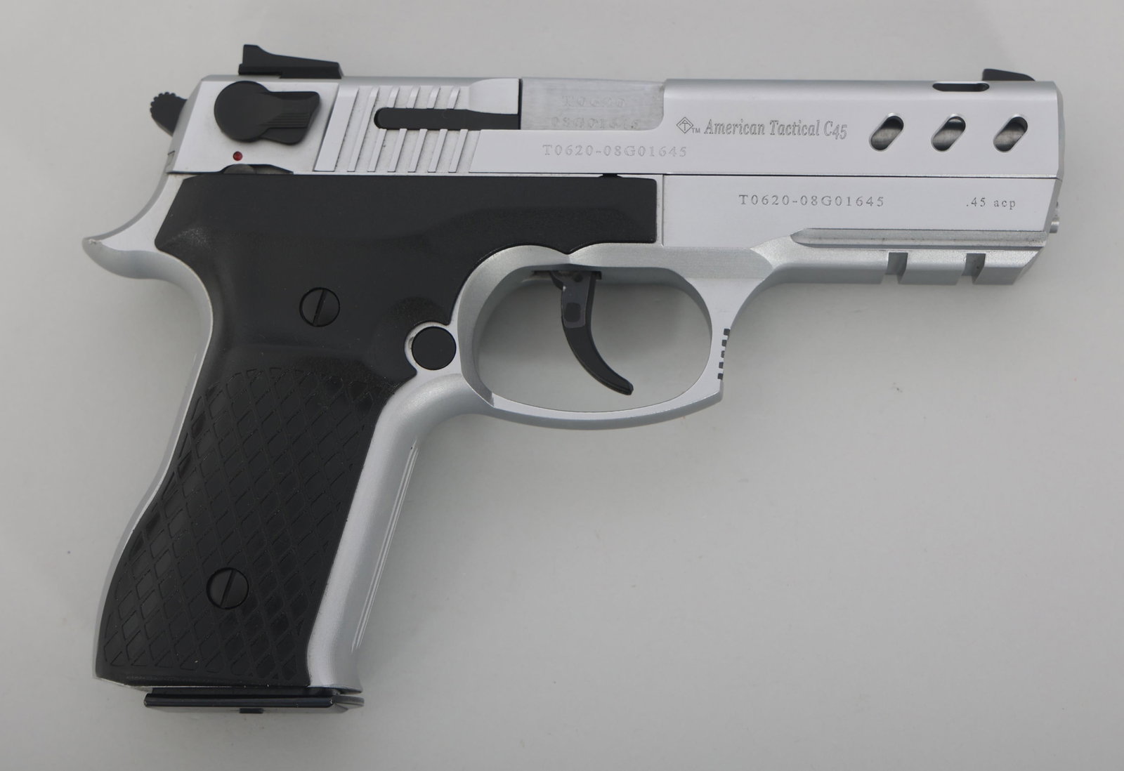 ATI MODEL C45 .45 ACP CALIBER SEMI AUTO PISTOL: ATI MODEL C45 .45 ACP CALIBER SEMI AUTO PISTOL American Tactical Imports Model C45 .45 ACP caliber semi automatic pistol. Import stamped "ATI". Matte stainless finish. Textured composite grips. Fixed 