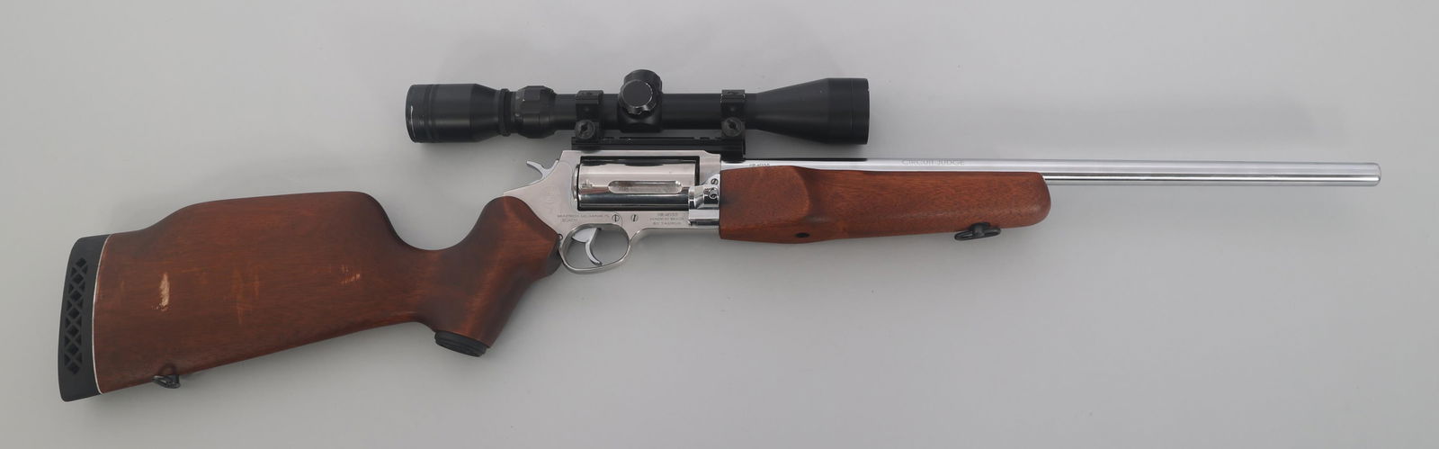 TAURUS MODEL CIRCUIT JUDGE .45 CAL/.410 GA RIFLE: TAURUS MODEL CIRCUIT JUDGE .45 CAL/.410 GA RIFLE Taurus Circuit Judge .45 Long Colt caliber / .410 Gauge revolving rifle / shotgun. Stainless finish. Removable Cylinder choke tube. Five shot fluted cy
