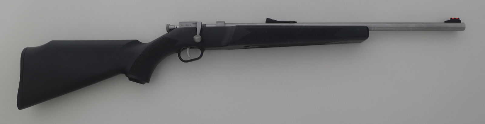 HENRY MODEL H007M ACU-BOLT 22 MAG CALIBER RIFLE: HENRY MODEL H007M ACU-BOLT 22 MAG CALIBER RIFLE Henry Model H007M ACU-Bolt .22 Magnum caliber single shot rifle. Stainless finish. Fiber optic sights. Checkered composite stock. Original cardboard box