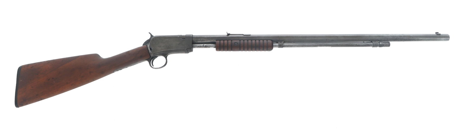 1913 WINCHESTER MODEL 1890 .22 WRF CALIBER RIFLE: 1913 WINCHESTER MODEL 1890 .22 WRF CALIBER RIFLE 1913 Winchester Model 1890 .22 WRF caliber pump action rifle. Blued finish. Wood stock. Adjustable rear sight. Octagonal barrel. Caliber / Gauge: 22 WR