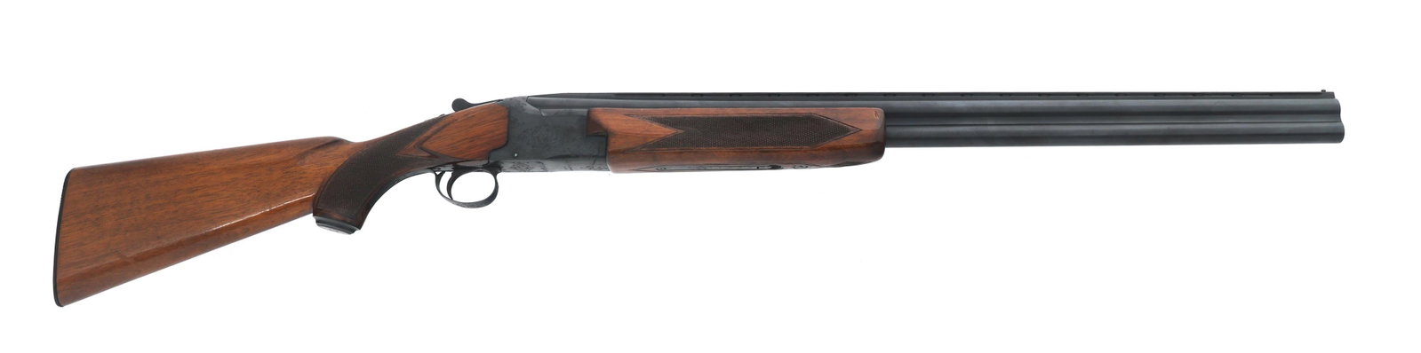 WINCHESTER MODEL 101 12 GAUGE OVER/UNDER SHOTGUN: WINCHESTER MODEL 101 12 GAUGE OVER/UNDER SHOTGUN Winchester Model 101 12 gauge over/under shotgun. 2.75" shells. Top barrel is fixed Modified choke. Bottom barrel is fixed full choke. Import stamped "