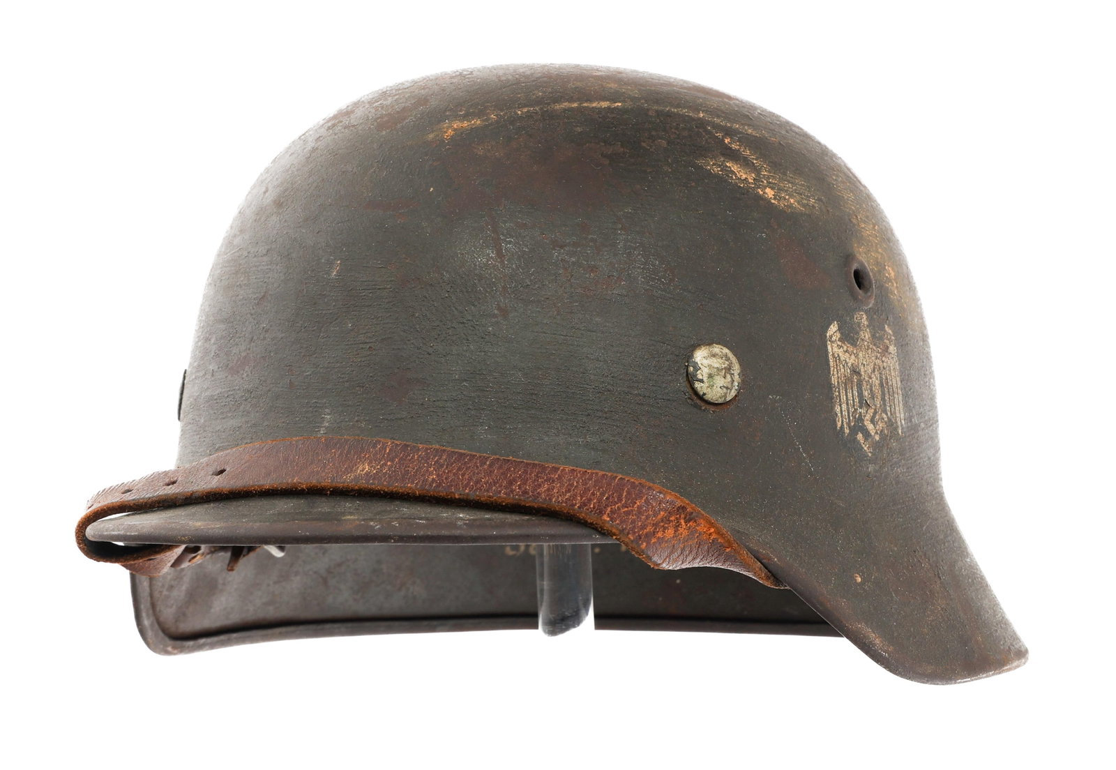 WWII GERMAN HEER M35 SD COMBAT HELMET: WWII GERMAN HEER M35 SD COMBAT HELMET WWII German Heer M35 SD Combat Helmet. Heer decal present. "ET64" and serial number 5037 stamped near the rim. "Schtz. Fr. Kaspari" hand written on the inside. Ei