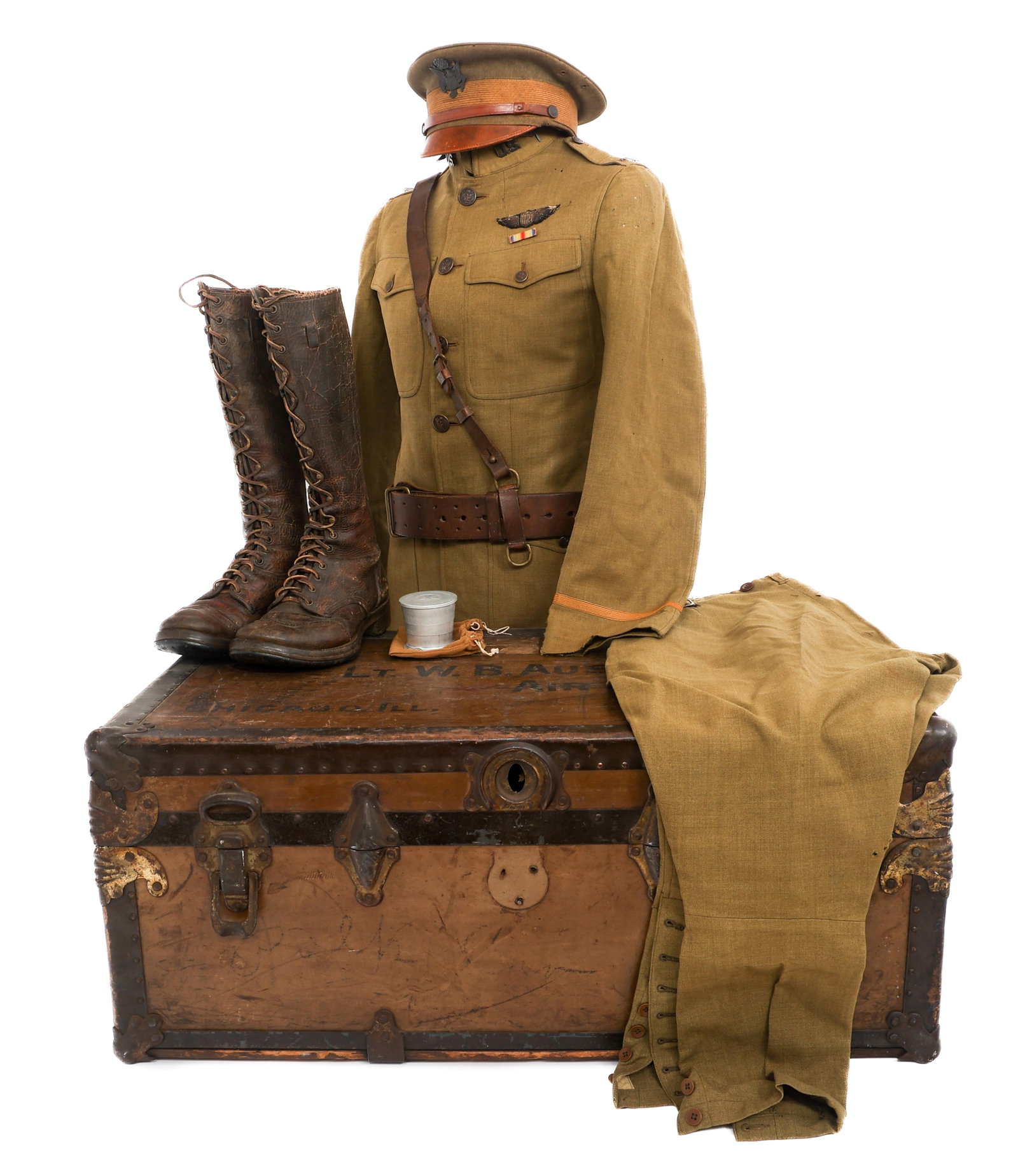 WWI AEF USAS NAMED PILOT UNIFORM GROUPING: WWI AEF USAS NAMED PILOT UNIFORM GROUPING WWI AEF US Air Service Pilot Uniform Grouping. Named to Lieutenant William Bernard Austin 972544 (1896-1967). (1) Officer's Uniform. Khaki, tailored, fine woo