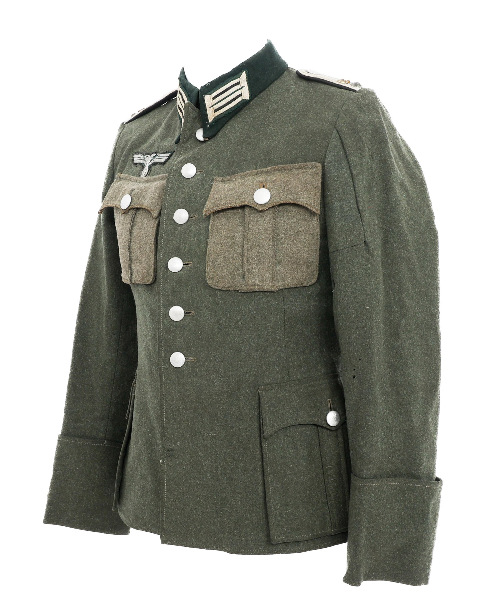 WWII GERMAN PIONEER OBERLUETNANT M36 SERVICE TUNIC: WWII GERMAN PIONEER OBERLUETNANT M36 SERVICE TUNIC WWII German Pioneer Oberleutnant M36 Service Tunic. Feldgrau wool construction with post war applied breast pockets, pioneer Oberleutnant shoulder bo
