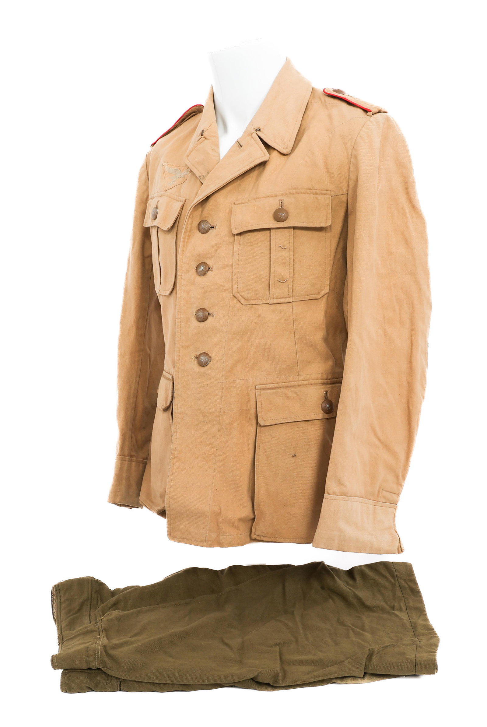 WWII GERMAN LUFTWAFFE FLAK EM TROPICAL UNIFORM: WWII GERMAN LUFTWAFFE FLAK EM TROPICAL UNIFORM WWII German Luftwaffe Flak Artillery Enlisted Uniform Set. (1) Flak Artillery Tropical Service Tunic. Khaki cotton construction with enlisted flak artill