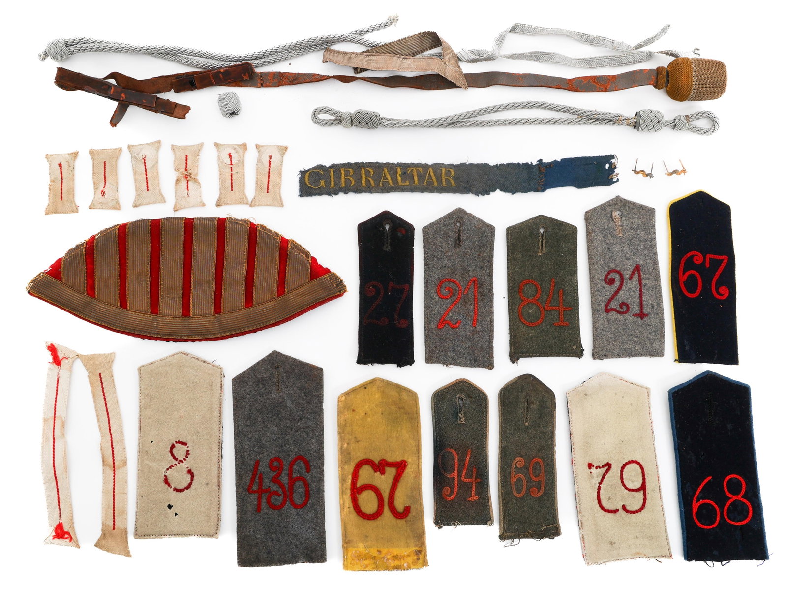 WWI - WWII GERMAN INSIGNIA & UNIFORM ACCOUTREMENTS: WWI - WWII GERMAN INSIGNIA & UNIFORM ACCOUTREMENTS WWI - WWII German Insignia and Uniform Accoutrements. Includes Gibraltar Cuff Title, Portepees, Collar Tabs, Shoulder Boards, Officer Visor Cap Chin 