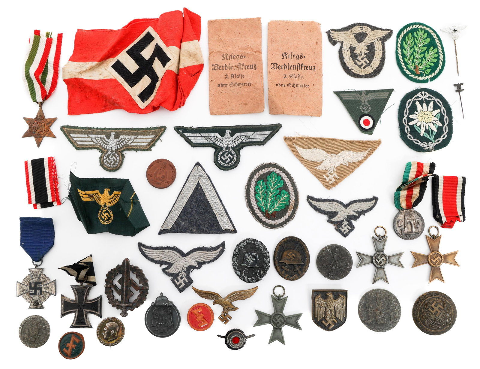 WWII GERMAN WEHRMACHT INSIGNIA, PATCHES & MEDALS: WWII GERMAN WEHRMACHT INSIGNIA, PATCHES & MEDALS WWII German Wehrmacht Insignia, Patches, Medals, Tinnies and More. (7) Luftwaffe, Heer Eagle cap and breast patches. (1) Luftwaffe Cloth Pilot's badge.