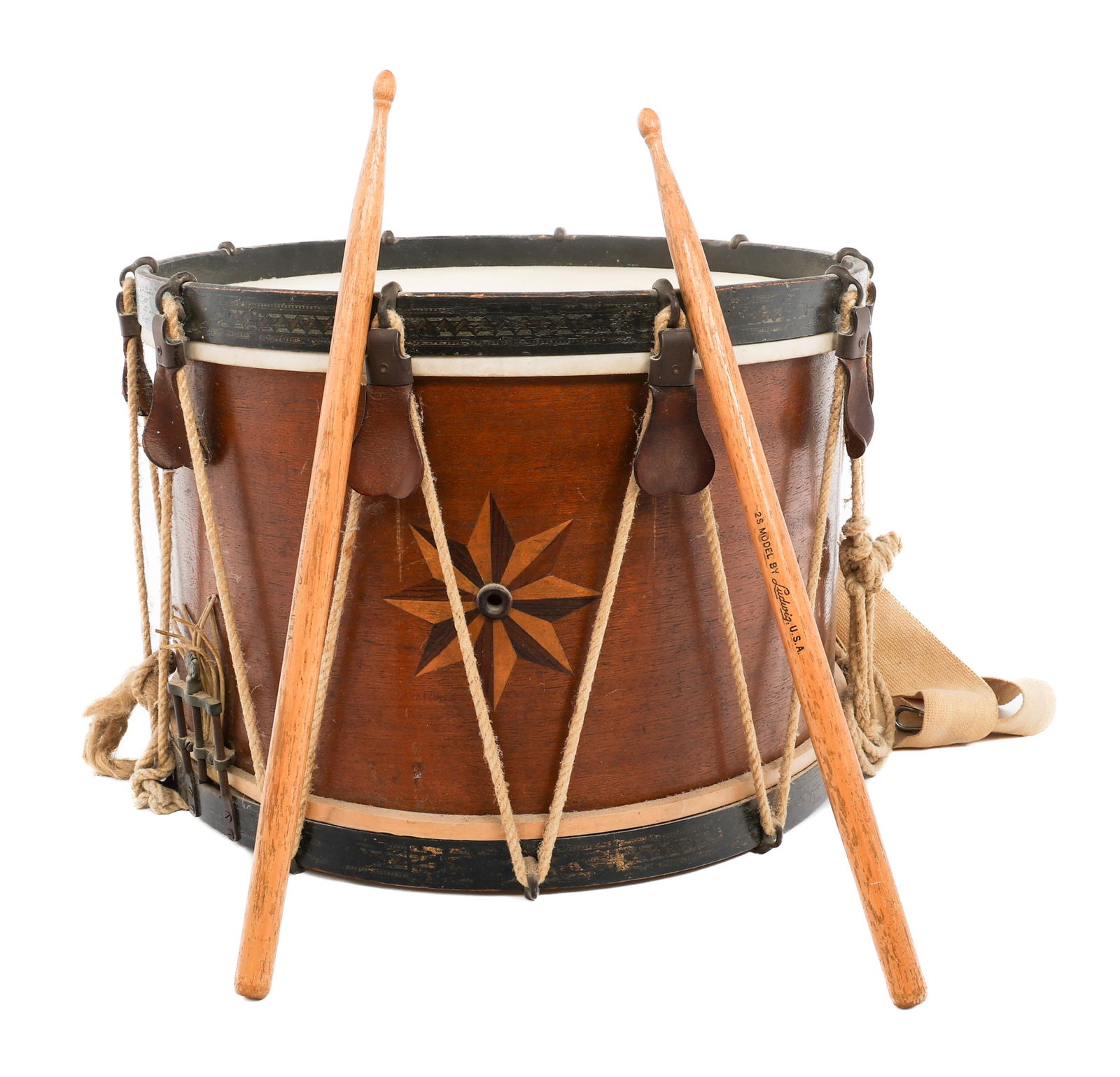 EARLY 20th C. US SNARE DRUM: EARLY 20th C. US SNARE DRUM Early 20th Century US Snare Drum. Eight pointed star painted around the peephole. Drumsticks by Ludwig. Includes carrying straps. Size: 12" x 16 1/2" x 16 1/2"