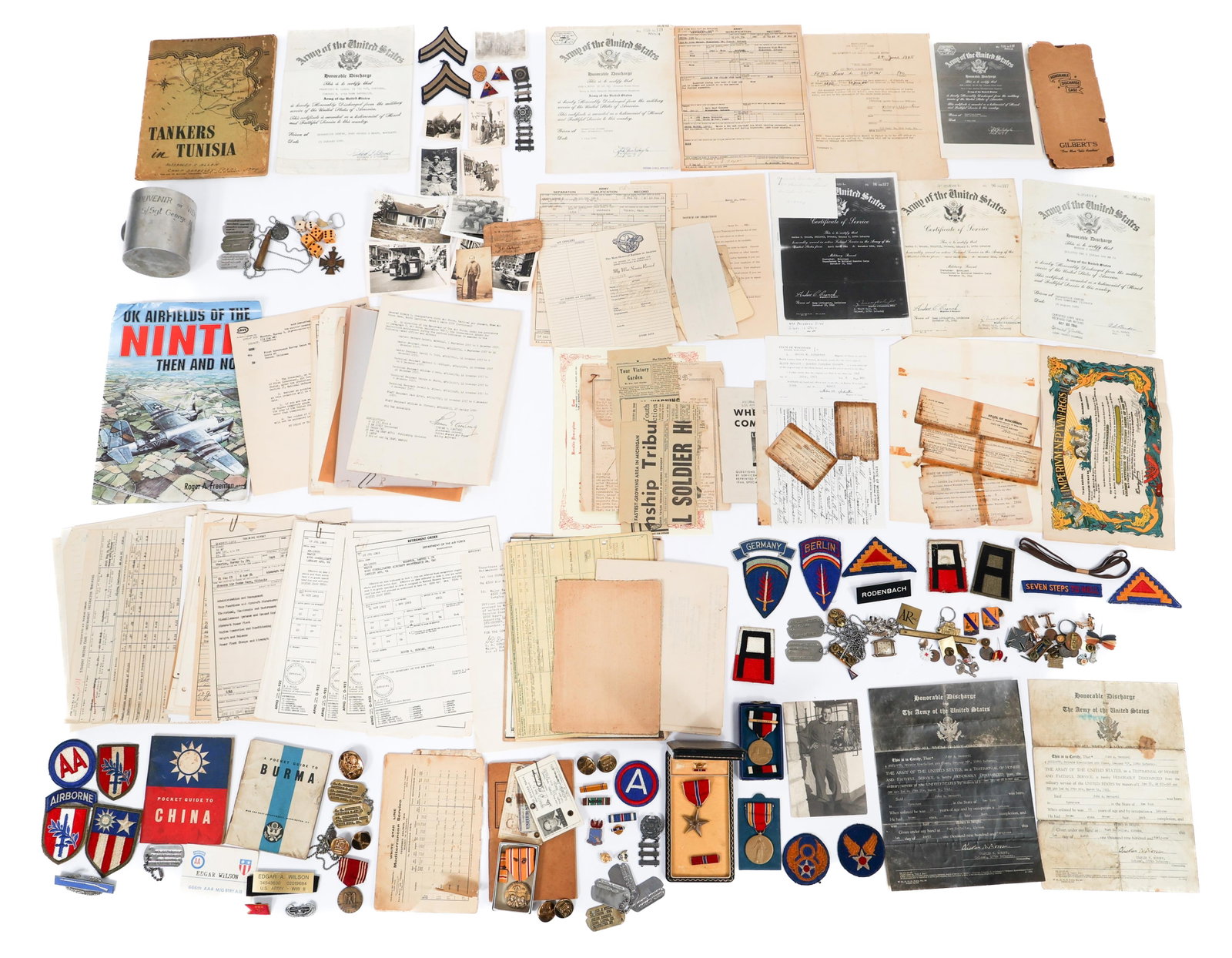 WWII US NAMED MEDAL & EPHEMERA GROUPINGS: WWII US NAMED MEDAL & EPHEMERA GROUPINGS WWII US Named Medal, Insignia, & Paperwork Groupings. Includes WIA paperwork grouping named to PFC Gordon C. Crouch. USAAF paperwork grouping named to Captain 