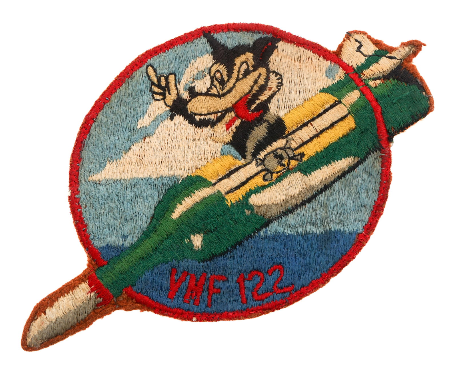 WWII USMC FIGHTER SQUADRON VMF-122 POCKET PATCH: WWII USMC FIGHTER SQUADRON VMF-122 POCKET PATCH WWII US Marine Corps Fighter Squadron VMF-122 Pocket Patch. Embroidered cotton construction. Size: 4 1/2" x 7 1/2" Provenance: Lifetime Military Memorab