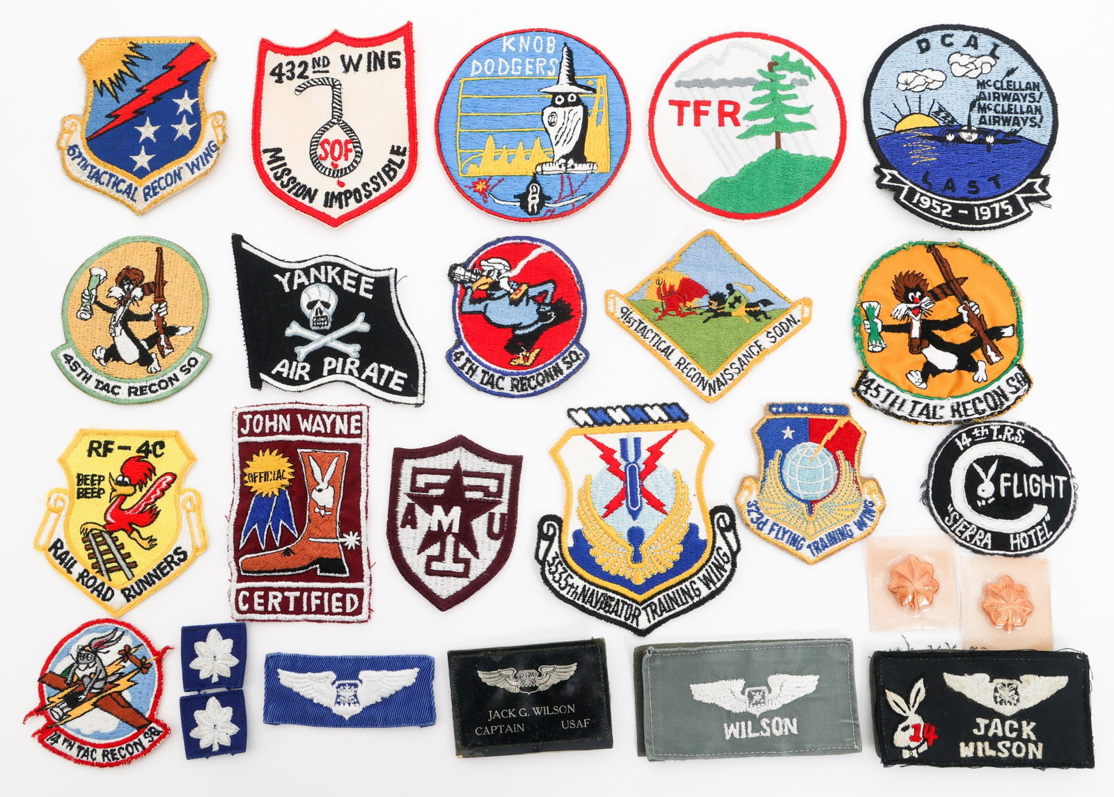 VIETNAM WAR USAF ATTRIBUTED PATCH GROUPING: VIETNAM WAR USAF ATTRIBUTED PATCH GROUPING Vietnam War US Air Force Attributed Patch Grouping. Attributed to major Jack G. Wilson. Includes name tabs named Wilson, rank insignia, Tactical Recon Squadr