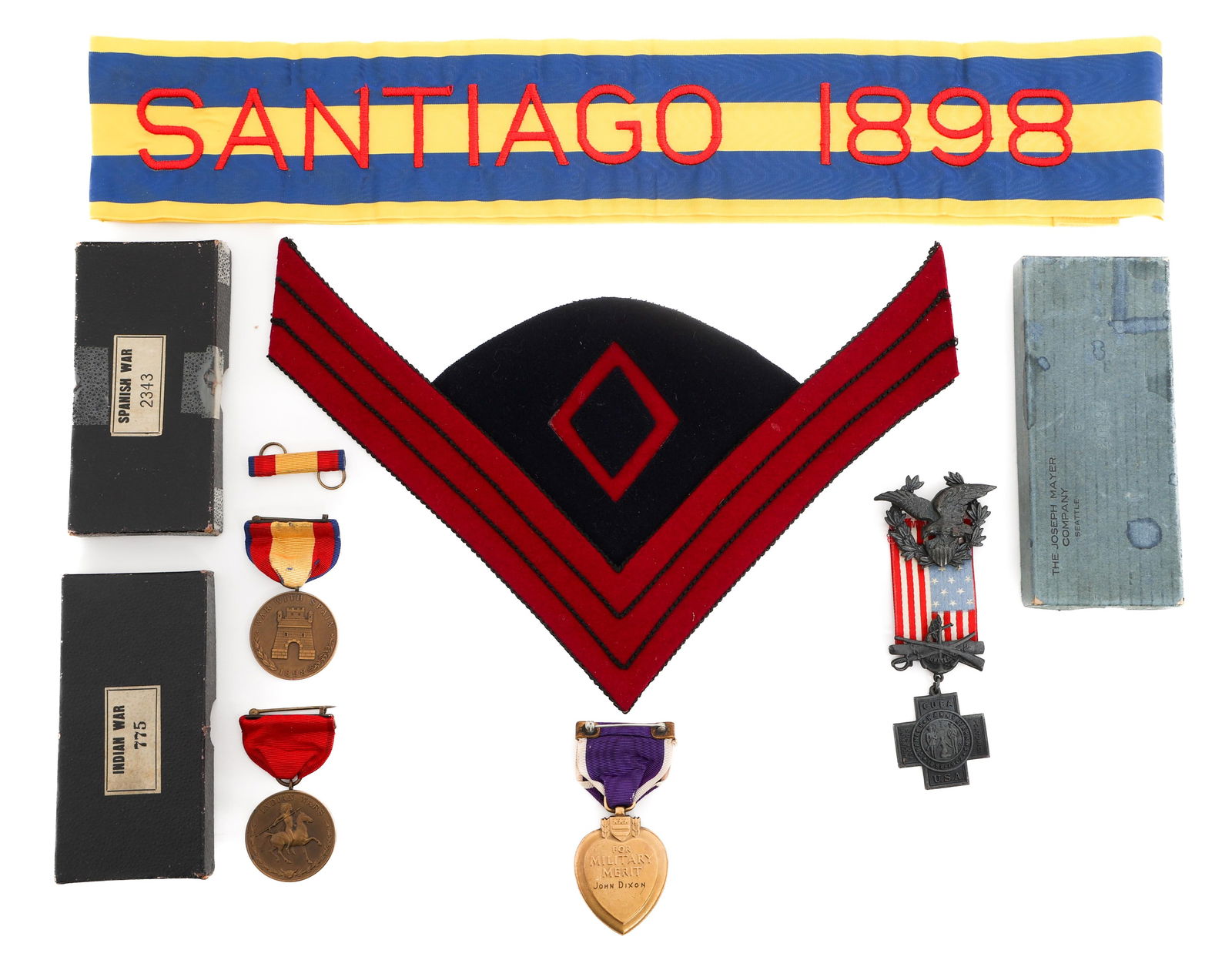 19th C. US NAMED PURPLE HEART, MEDALS, & INSIGNIA: 19th C. US NAMED PURPLE HEART, MEDALS, & INSIGNIA Indian Wars - Spanish American War US Army Purple Heart, Service Medals, & Insignia. (1) Purple Heart named to John Dixon, numbered 19565. Split wrap