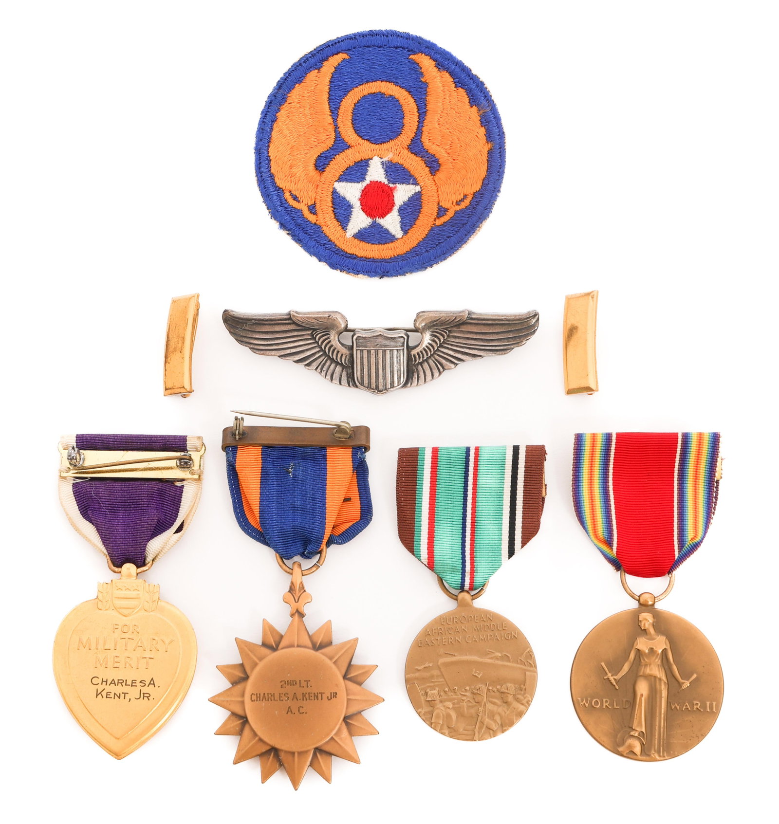 WWII USAAF 352nd BOMB SQ KIA NAMED MEDAL GROUP: WWII USAAF 352nd BOMB SQ KIA NAMED MEDAL GROUP WWII USAAF 352nd Bomb Squadron, 301st Bomb Group KIA Medal & Insignia Grouping. Named to 2nd Lieutenant Charles A. Kent Jr. (1) Purple Heart named to Ken