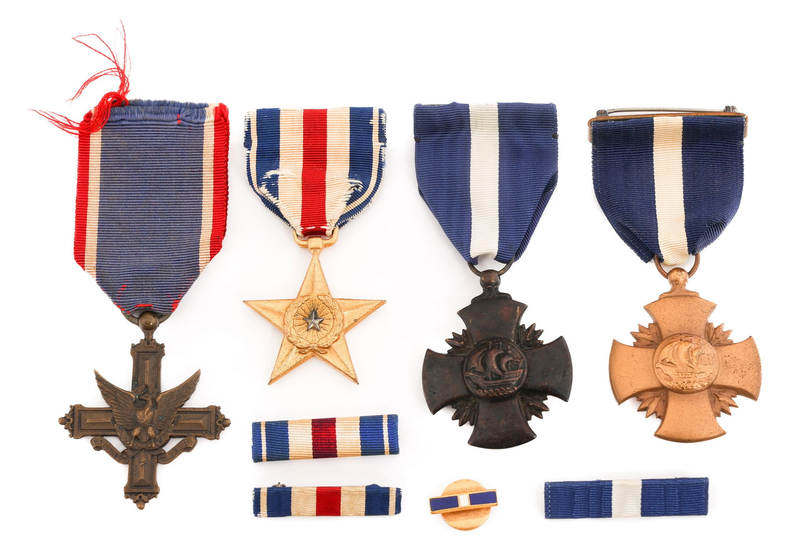 WWI - WWII US NAVY CROSS, SILVER STAR & DSC MEDALS: WWI - WWII US NAVY CROSS, SILVER STAR & DSC MEDALS WWI - WWII US Armed Forces Navy Cross, Silver Star, & Distinguished Service Cross Grouping. (1) "Black Widow" Navy Cross. Full wrap brooch. (1) Navy 