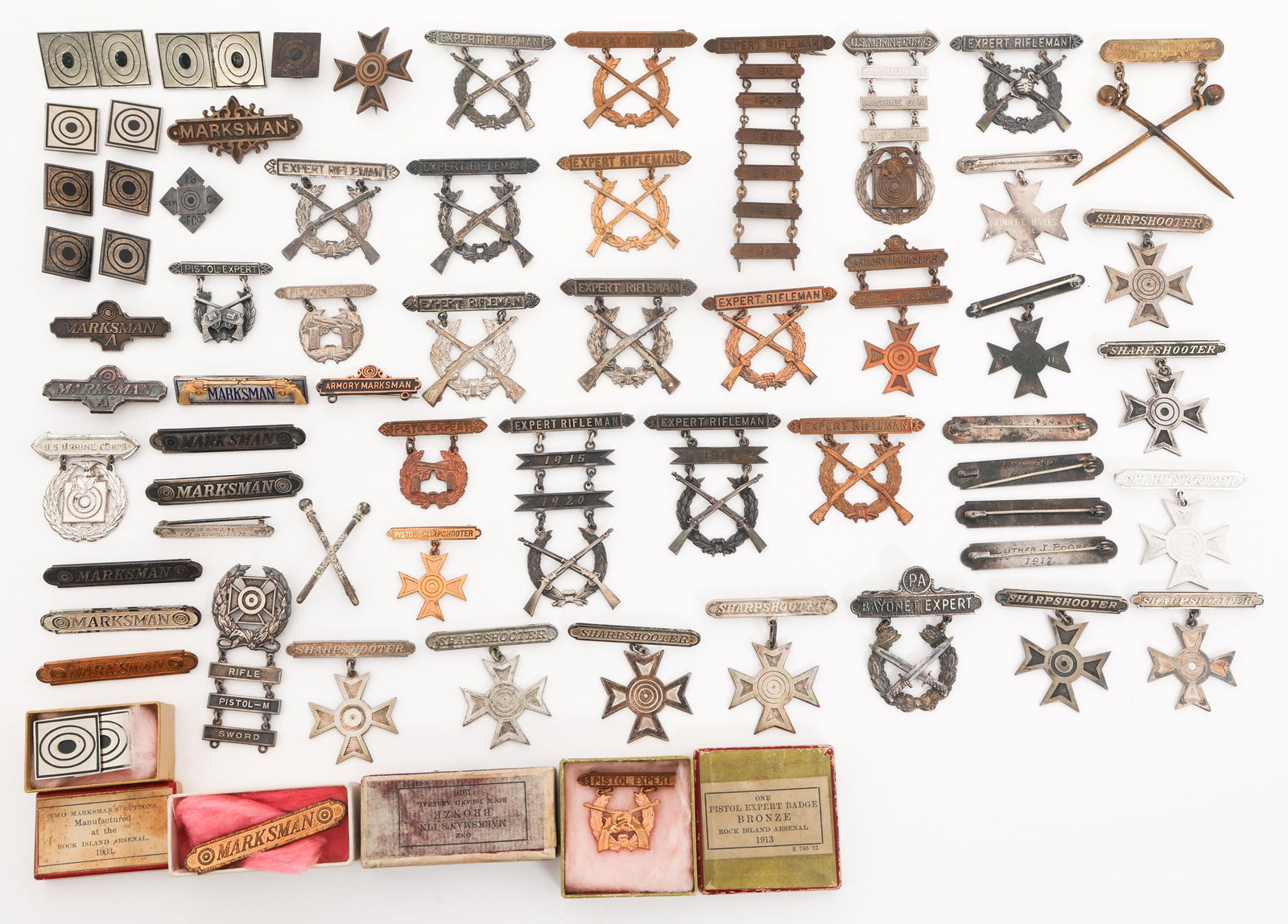 WWI - WWII US ARMY & USMC MARKSMANSHIP BADGES: WWI - WWII US ARMY & USMC MARKSMANSHIP BADGES WWI - WWII US Army & Marine Corps Marksmanship Badges. Includes USMC Expert Rifleman, Pistol Experts, Marksman Bars, target buttons, Sharpshooter badges,