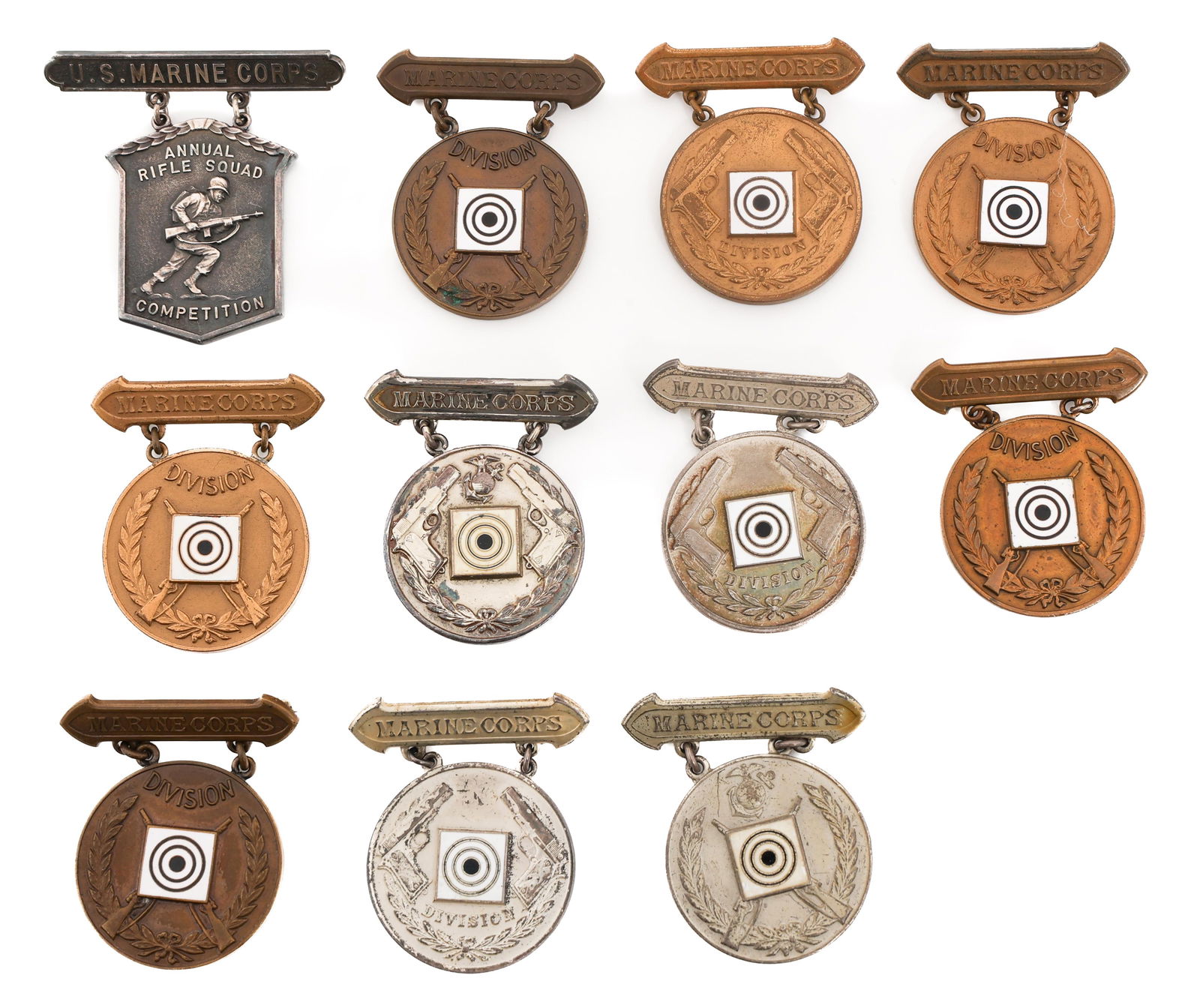WWI - COLD WAR USMC NATIONAL & DIV MARKSMAN BADGES: WWI - COLD WAR USMC NATIONAL & DIV MARKSMAN BADGES 1914 - Cold War USMC National and Division Marksman Badges. Majority are named and dated. (5) Rifle Division. (1) Rifle National. (1) Pistol National