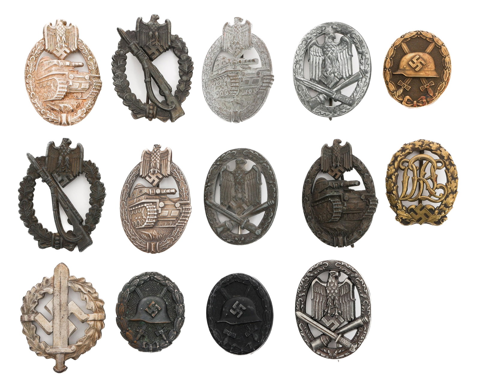WWII GERMAN WOUND BADGES & COMBAT AWARDS: WWII GERMAN WOUND BADGES & COMBAT AWARDS WWII German Wound Badges & Combat Awards. (4) Panzer Assault Badges. One is maker marked by "DH". Others have no visible marks or stamps. (3) Black Wound Badge