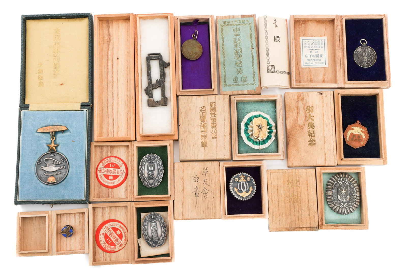 WWII IMPERIAL JAPANESE MEDALS, BADGES & PINS: WWII IMPERIAL JAPANESE MEDALS, BADGES & PINS WWII Imperial Japanese Medals, Badges and Pins. All include original award boxes. (1) China Incident Hokkaido Badge. (1) IJN Veteran's Association Badge. (