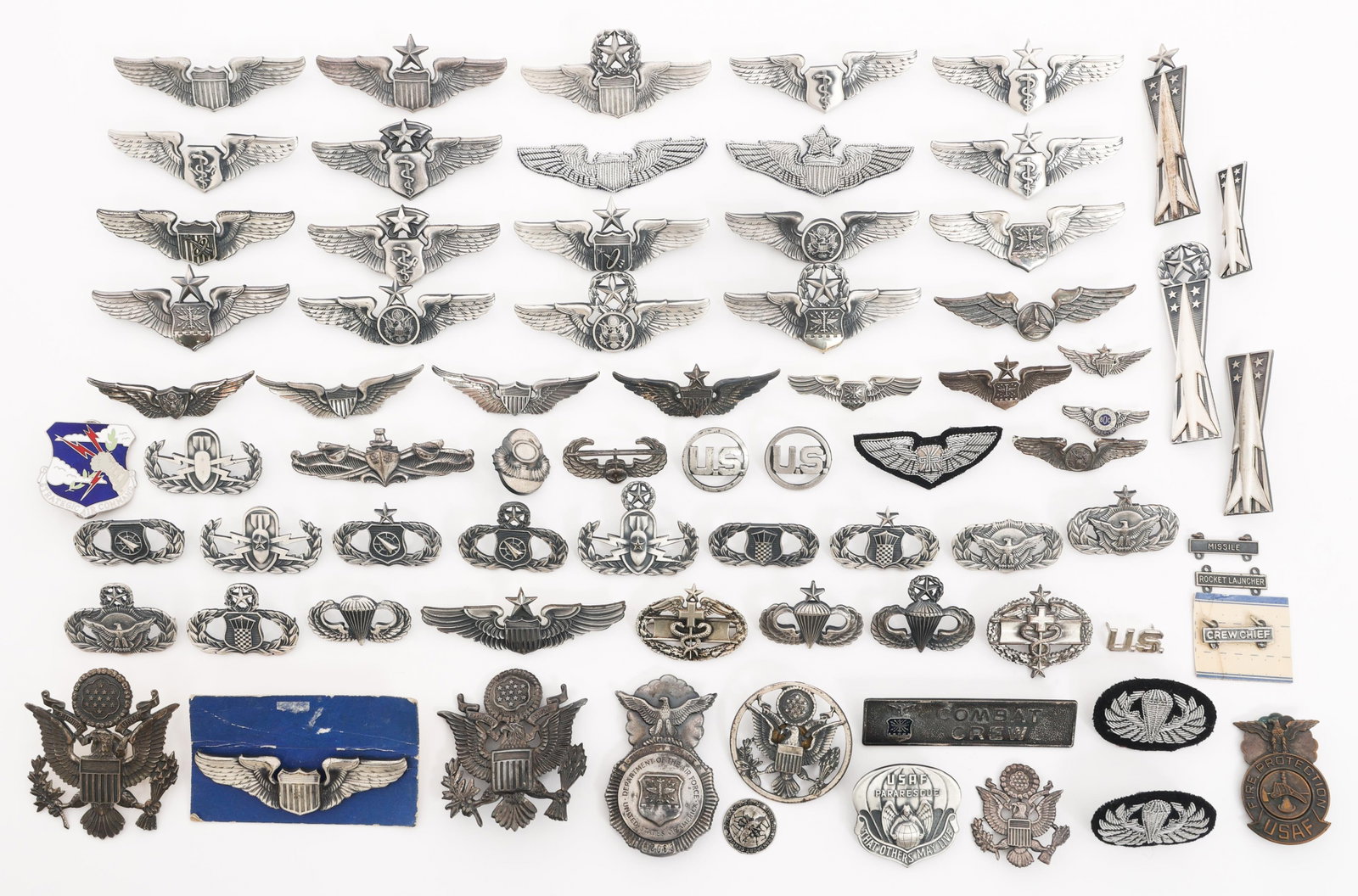 COLD WAR US ARMED FORCES WINGS, BADGES, & INSIGNIA: COLD WAR US ARMED FORCES WINGS, BADGES, & INSIGNIA Cold War US Armed Forces Wings, Badges, and Insignia. Includes USAF Pilot Wings, Army Aviator Wings, USN Surface Warfare Specialist badge, Air Crew W