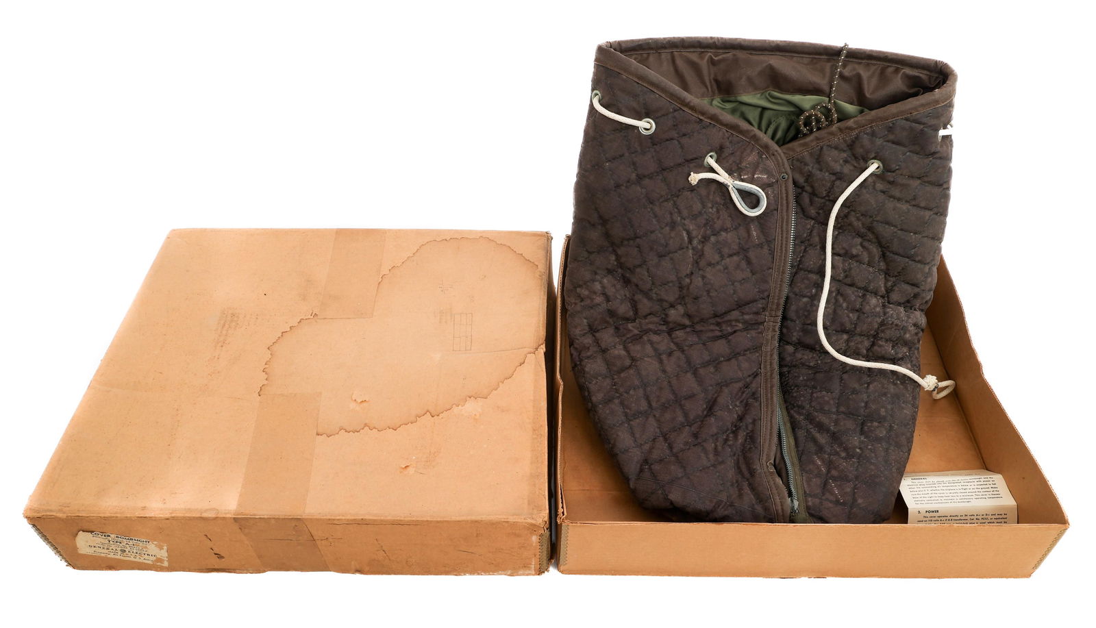 WWII US TYPE A-1 M9 NORDEN BOMB SIGHT HEATED COVER: WWII US TYPE A-1 M9 NORDEN BOMB SIGHT HEATED COVER Unissued WWII USAAF Type A-1 M-9 Norden Bomb Sight Heated Cover In Original Box. Quilted cotton with a satin liner. Cinch rope, zipper and webbed han