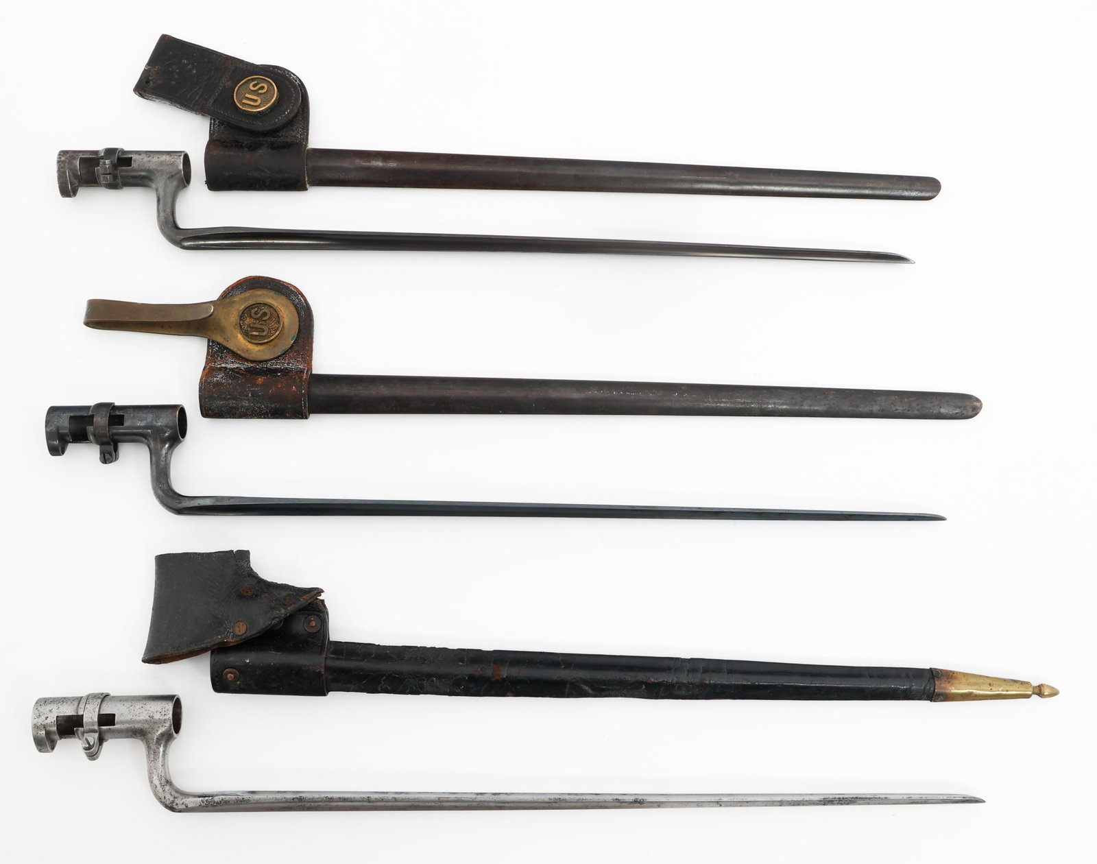 US M1855 & M1873 SOCKET BAYONETS: US M1855 & M1873 SOCKET BAYONETS US M1855 and M1873 Socket Bayonets with Scabbards. All stamped US. (1) M1855. (2) M1873. Blade Length: 18" Total Length: 21"