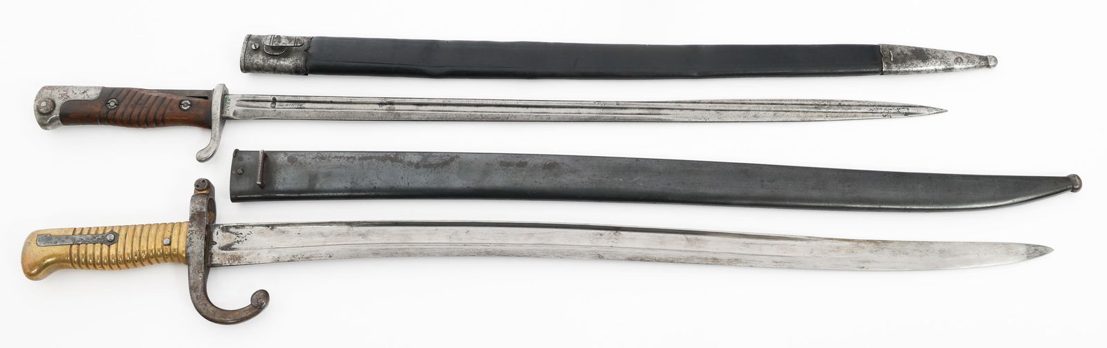 19th C. GERMAN M1898 & FRENCH M1866 BAYONETS: 19th C. GERMAN M1898 & FRENCH M1866 BAYONETS 19th Century German and French Bayonets. (1) German M1898. Single edged blade with maker mark of WKC stamped on the ricasso, Imperial proof stamps on the s
