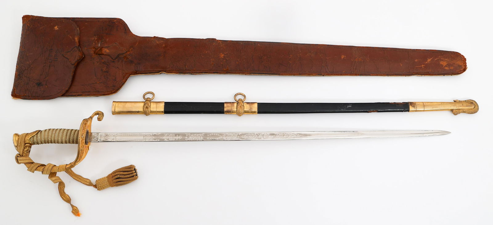 US NAVY M1852 OFFICER DRESS SWORD: US NAVY M1852 OFFICER DRESS SWORD US Navy M1852 Officer Dress Sword. Single edged, bright blade with fuller. Double acid etched with naval & patriotic designs. No visible maker marks. Leather buffer p