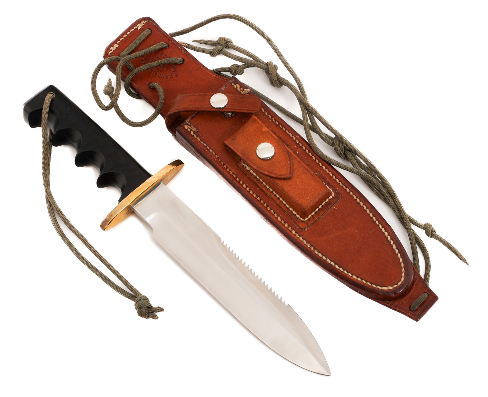RANDALL MODEL 18 ATTACK SURVIVAL KNIFE: RANDALL MODEL 18 ATTACK SURVIVAL KNIFE Randall Model 18 Attack Survival Knife. Single edged, bright blade with serrated spine. Maker mark of Randall Made Orlando, Fla stamped near the ricasso. Double