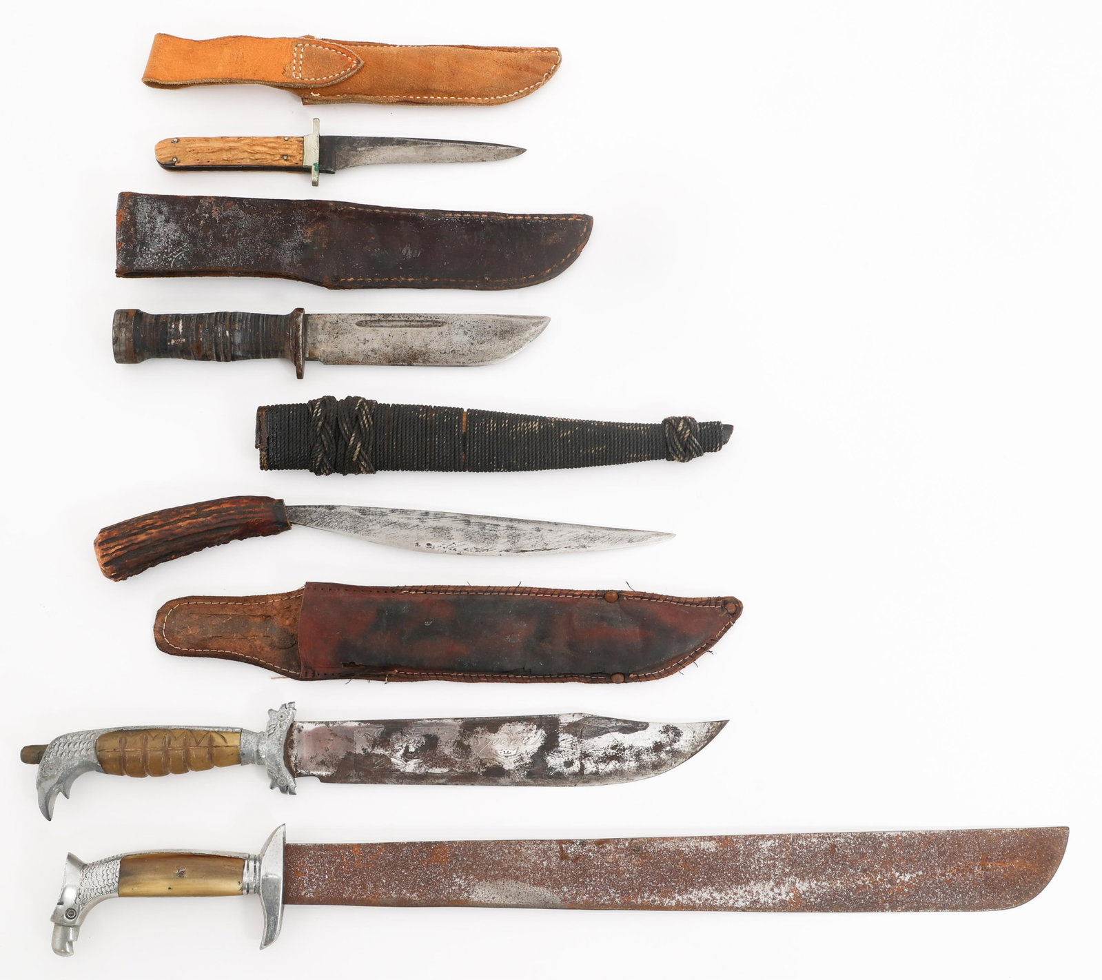 19th C. - WWII WOSTENHOLM & CATTARAUGUS 225 KNIVES: 19th C. - WWII WOSTENHOLM & CATTARAUGUS 225 KNIVES 19th C. - WWII George Wostenholm, US Cattaraugus 225 Q, Ethnographic, and Souvenir Knives. (1) Cattaraugus 225 Q. Single edged blade with fuller. Mak