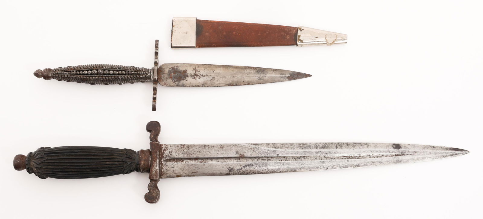 MODERN CIVILIAN / FANTASY DAGGERS: MODERN CIVILIAN / FANTASY DAGGERS Modern Civilian / Fantasy Daggers. Double edged blades with steel hilts. No visible marks. One includes leather sheath with alloy based fittings. Blade Length: 6" to