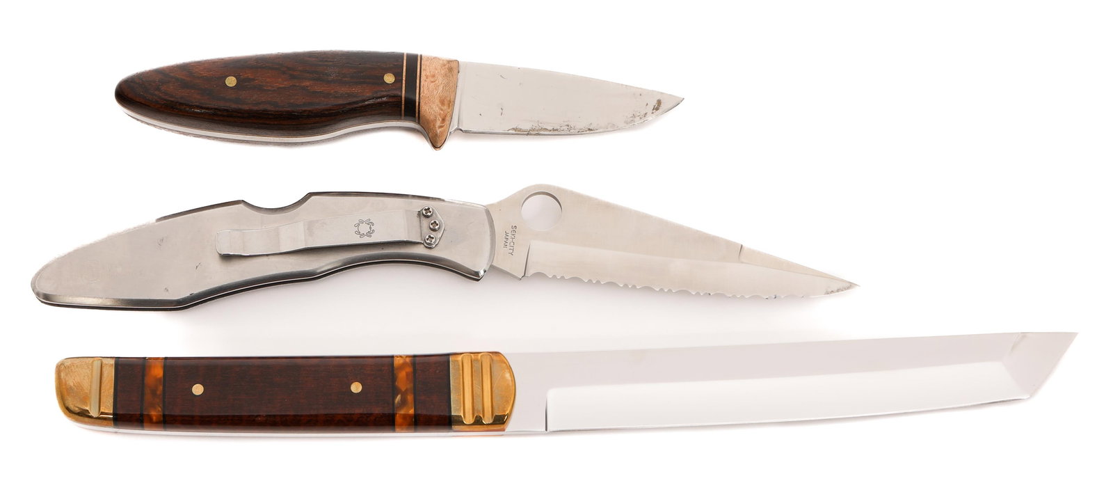 MODERN FOLDING, FIXED BLADE, & TANTO KNIVES: MODERN FOLDING, FIXED BLADE, & TANTO KNIVES Modern Civilian Folding, Fixed Blade and Tanto Knives. Makers include Mark Everett Waite and Spyder Co. Blade Length: 2 5/8" to 6 3/8" Total Length: 6 1/2"