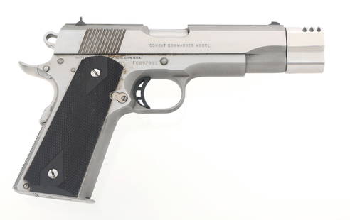 COLT MODEL COMBAT COMMANDER .45 ACP CALIBER PISTOL: COLT MODEL COMBAT COMMANDER .45 ACP CALIBER PISTOL Colt Model Combat Commander .45 ACP caliber semi automatic pistol. Stainless finish. Barrel bushing muzzle device. Fixed sights. Checkered wood