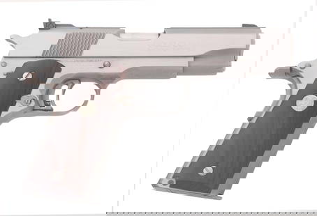 COLT GOLD CUP NATIONAL MATCH COMMANDER CUSTOM: COLT GOLD CUP NATIONAL MATCH COMMANDER CUSTOM Colt Gold Cup National Match Commander Custom .45 ACP caliber semi automatic pistol. Stainless steel finish. Wood grips with Colt Medallion. Adjustable