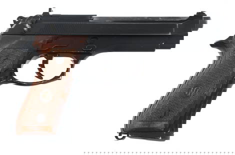 BERETTA MODEL 92F 9mm CALIBER SEMI AUTO PISTOL: BERETTA MODEL 92F 9mm CALIBER SEMI AUTO PISTOL Beretta Model 92F 9x19mm caliber semi automatic pistol. Blued finish. Checkered wood grips. Fixed sights. One magazine. Caliber / Gauge: 9x19mm Barrel